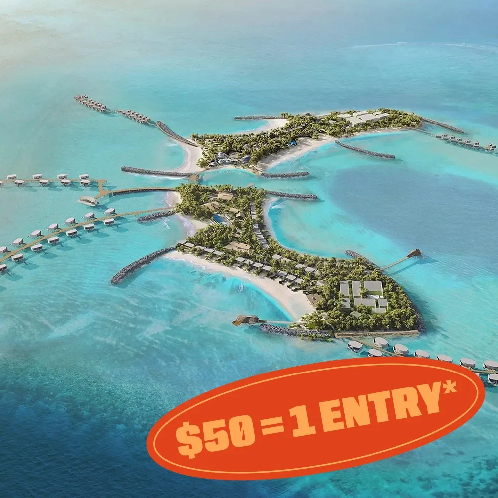 Luxury tropical island resort surrounded by turquoise ocean water